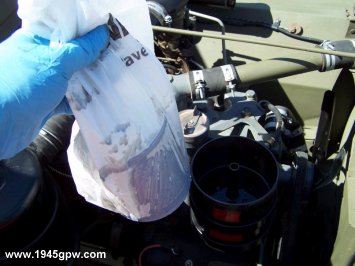 I quickly put the old filter into the baggies, and tie it up for disposal at our approved Oil disposal location here in town.