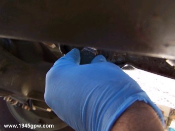 Install the bottom plug back into the pan. Tighen clockwise