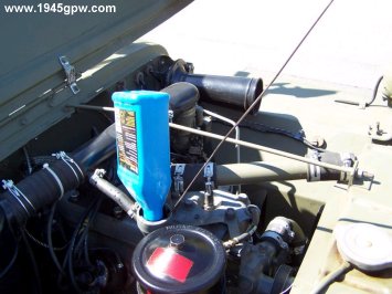 The TM's call for 30 weight oil. I use 10w30. Stay away from the higher viscosity oils like 20w50. Add Oil checking the amount on the dipstick. Its a little over 4 quarts.